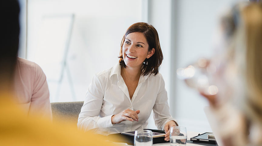 Photo of a woman in team leader training, learning more about team collaboration training and skill-building with the Center for Creative Leadership