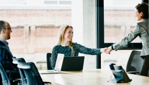 People discussing Why Trust Is Critical to Team Success - the value of trust in the workplace