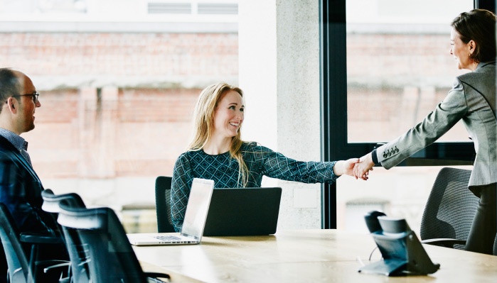 People discussing Why Trust Is Critical to Team Success - the value of trust in the workplace