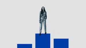 image of young woman standing on bar graph representing leaders of tomorrow